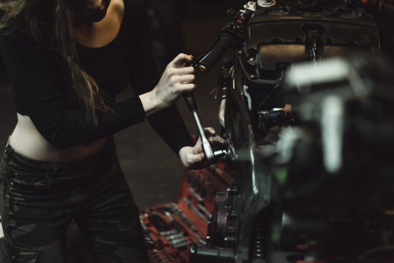 Quais são as maiores empresas de filmes? 1 beautiful girl with long hair garage repairing motorcycle